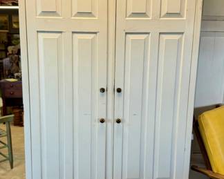 Pair of antique paneled storage cabinets from a historic Chattanooga railroad depot. Fantastic industrial, farmhouse, mercantile, and primitive appeal with original cubbies, shelving, and incredible architectural presence. Perfect for kitchen storage, linen cabinets, retail display, or pantry use. A rare matching pair with outstanding character and patina.