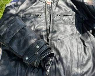 Harley Davidson riding leathers. Several jackets. Chaps. Rain gear. 