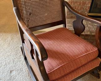 Pair of cane back wooden chairs One rocker and the other fixed. circa 1920's 
