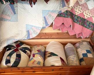 Lane Cedar Chest filled with handcrafted handstitched quilts 