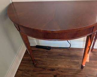 Half round cherry finish table
