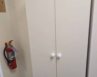 Two-door storage cabinet. One of two