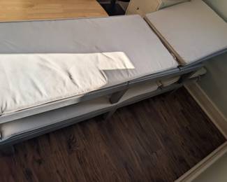 Two small medical patient beds