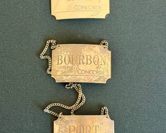 Three vintage sterling silver British Airways Concorde decanter labels