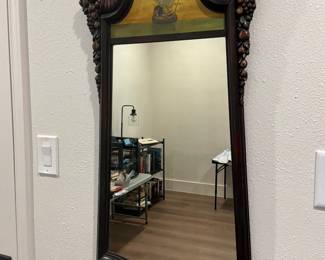 Vintage British colonial tradewind style wall mirror featuring a Bonnet accent and painted ship scene
