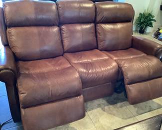 All leather double recline sofa 81L by 41H