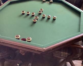 Three in one featuring bumper, pool poker, and a solid wood top