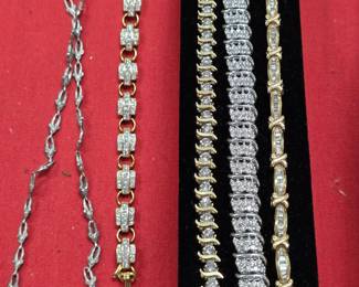 Diamonds and 14K bracelets. Necklace is 14K and Platinum. 