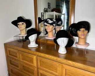 An array of mid-century women's cocktail, formal, and wide-brim hats.