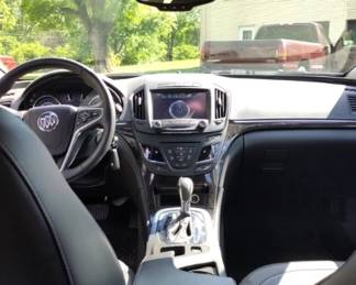 Interior Luxury: Outfitted with a black leather interior, power-adjustable heated front seats, dual-zone digital climate control command station, and full power controls.