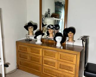 An array of mid-century women's cocktail, formal, and wide-brim hats.