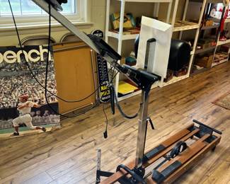 NordicTrack Ski Machine: A classic vintage NordicTrack wooden and steel cross-country ski exerciser machine.