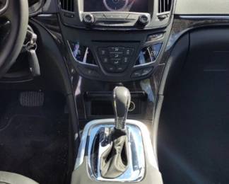 Interior Luxury: Outfitted with a black leather interior, power-adjustable heated front seats, dual-zone digital climate control command station, and full power controls.