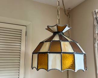 A gorgeous vintage 1970s hanging slag glass swag lamp shade