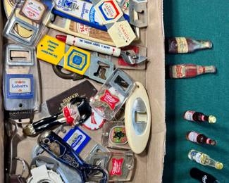 A treasure-trove box packed with vintage beer and soda advertising churchkey/can openers. Features brands like Molson Canadian, Coors Light, Miller High Life, Labatt's, Black Label, Budweiser, Henninger, and a neat local blue Cinci Beer opener!