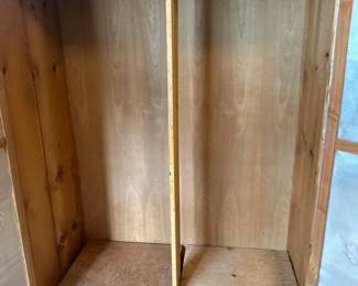 Handmade wood armoire with punched metal design (inside view)