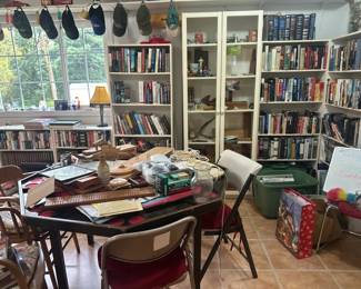 Books, bookshelves, gaming table