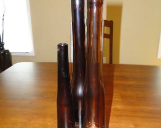 Tall root beer colored vases