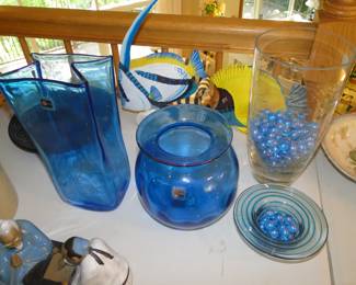 Blue glass items, and blue colorful marbles