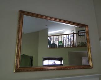Yes, this mirror is large, and heavy, and trimmed in gold
