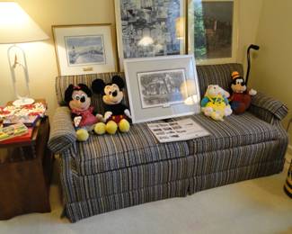 Fun retro couch with lots of great Disney Plush animals