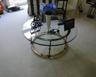 Round metal and glass table