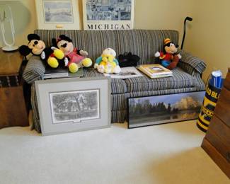 More framed artwork and Disney plush toys