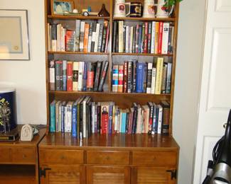 We have a nice collection, not a large collection of books, and that bookcase is an Ethan Allen bookcase