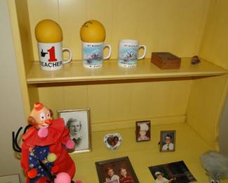 Mugs and one hella scary clown