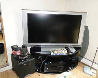 TV, stand all all the speakers