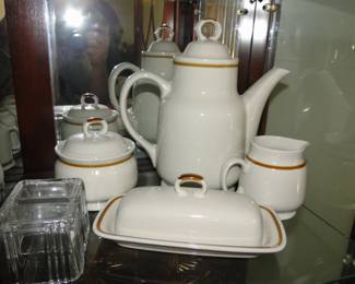 This coffee or tea set, complete with butter dish is also made from Genuine Stoneware