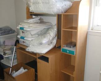 See, linens and pillows look good on the desk