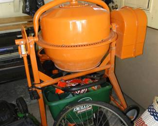 See, orange cement mixer, with fertilizer spreader