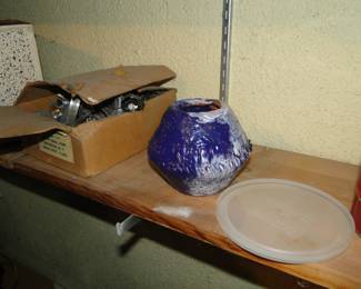 This here is a very rare, super collectible hand thrown pottery piece, made in High School era