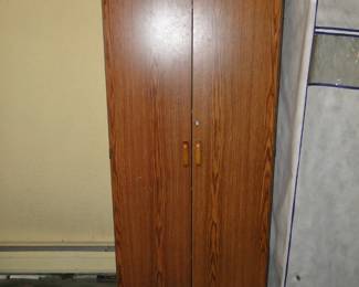 Tall storage cabinet