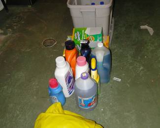 Laundry and cleaning supplies, buckets and boxes full