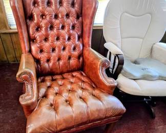 Tufted leather wingback chairs