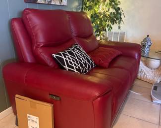 Red leather couch and love seat with recliners 