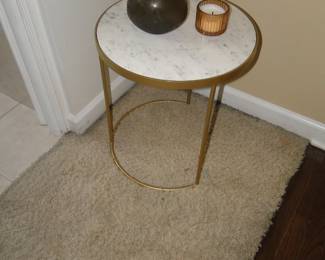 Rose gold end table with marble top
