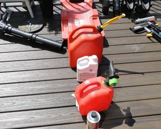Automotive creeper and gas cans
