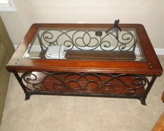 Glass topped wood and metal table