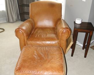 Very well cared for leather chair and matching ottoman