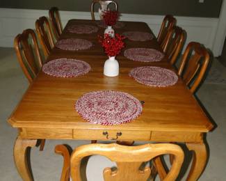 Very large dining room table and chairs set