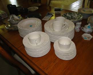 Beautiful set of white dishes that you can mix and match with other patterns!  Go on just do it, live on the wild side