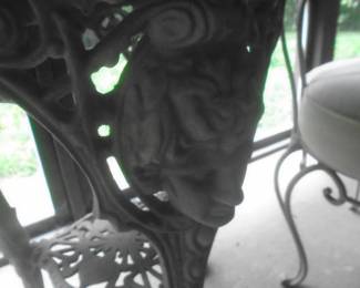 close up of cherub table legs