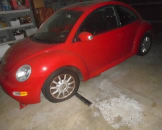 2005 VW Beatle 51,000 miles. This item is not part of the trust and can't be sold until sometime in August.