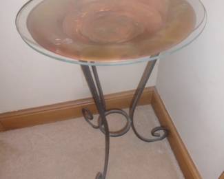 Glass top table with copper bowl