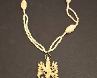 Vintage Carved Bone Pendant Necklace with Figural Scene