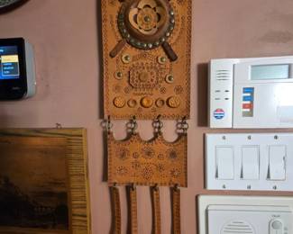 Vintage Handtooled Leather Wall Hanging with Embossed Floral and Geometric Design