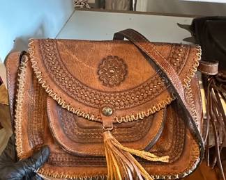 Vintage Tooled Leather Shoulder Bag with Tassel and Medallion